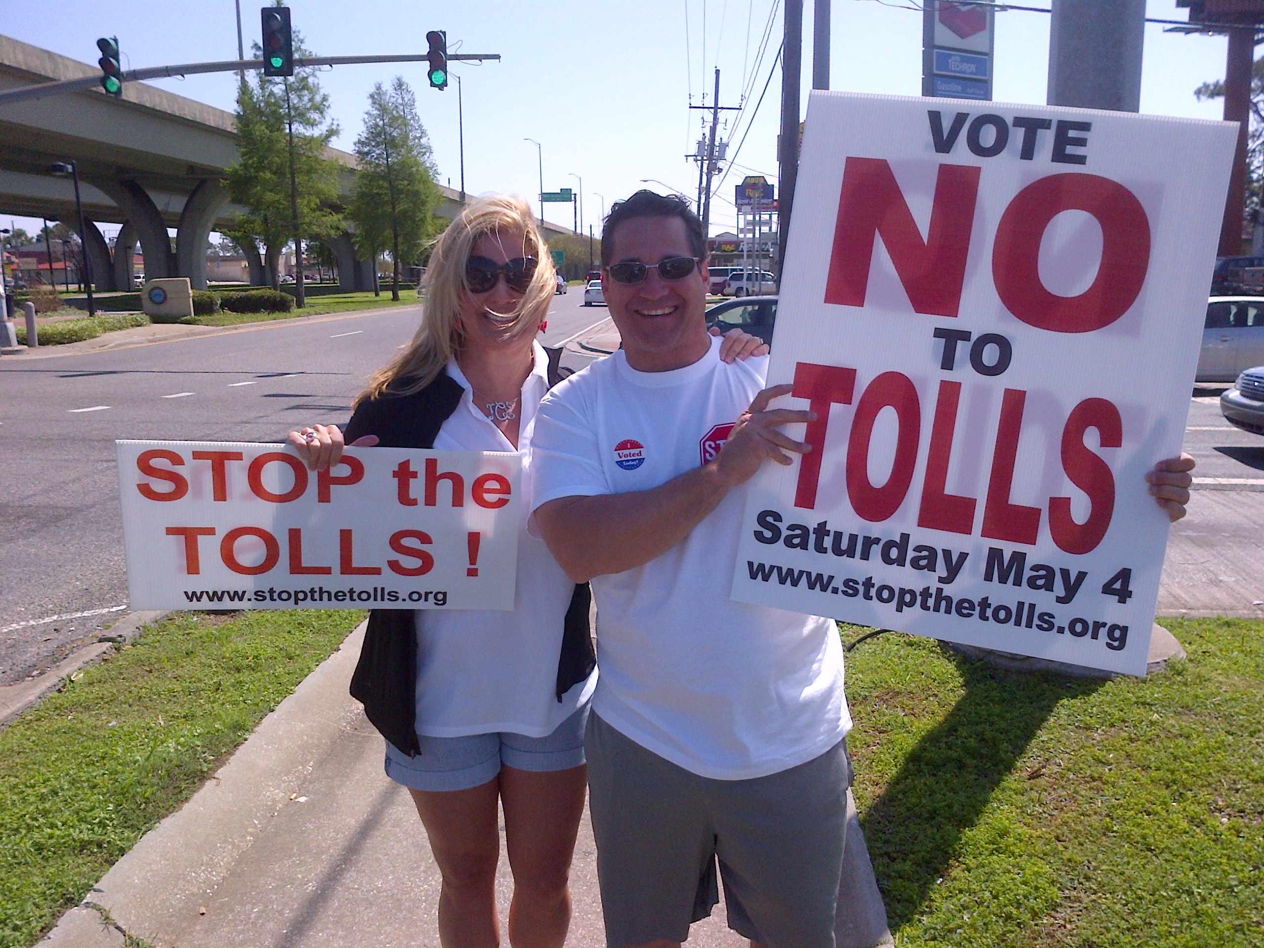 troyandpaige2 shaking signs early voting.jpg